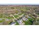 High angle of neighborhood with many properties, lawns, and swimming pools in a suburban area at 168 Yorkshire W Blvd, Cumberland, IN 46229