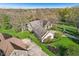 Aerial view of a landscaped property, featuring a well-maintained lawn and inviting curb appeal at 168 Yorkshire W Blvd, Cumberland, IN 46229