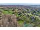Expansive aerial view of a residential community featuring large lots and mature trees at 168 Yorkshire W Blvd, Cumberland, IN 46229