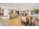 Open basement area featuring a bar, lounge, and dining space, perfect for relaxing and entertaining at 168 Yorkshire W Blvd, Cumberland, IN 46229