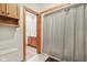 Bathroom featuring a wood vanity, mirror and shower at 168 Yorkshire W Blvd, Cumberland, IN 46229