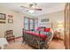 Bedroom with patriotic decor, wooden window trim, and lots of natural light at 168 Yorkshire W Blvd, Cumberland, IN 46229