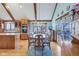 Dining area featuring hardwood floors, wood cabinets, and lots of natural light at 168 Yorkshire W Blvd, Cumberland, IN 46229