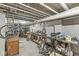 Basement with unfinished ceiling and cement floors used as a workshop at 1710 S Butler Ave, Indianapolis, IN 46203