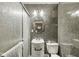 Bathroom features a stand up shower and single sink vanity at 1710 S Butler Ave, Indianapolis, IN 46203