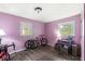 Bedroom with two windows and wood floors at 1710 S Butler Ave, Indianapolis, IN 46203