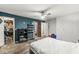 Main bedroom features a ceiling fan, walk-in closet and ensuite bathroom at 1710 S Butler Ave, Indianapolis, IN 46203