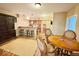 Basement bar area with seating and kitchenette perfect for entertaining guests at 18756 Brookston Ln, Noblesville, IN 46062