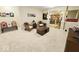Finished basement with a cinema theme, seating area, and bar in the background at 18756 Brookston Ln, Noblesville, IN 46062