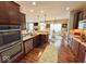Well-equipped kitchen featuring stainless steel appliances, ample cabinet space, and an adjacent dining area for easy meals at 18756 Brookston Ln, Noblesville, IN 46062