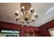 A candelabra style chandelier that is embellished with crystals at 23 N West St, Shelbyville, IN 46176