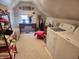 Laundry room with washer, dryer, desk, and carpet at 23 N West St, Shelbyville, IN 46176
