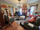 Spacious living room with fireplace, elegant furnishings, and ample natural light at 23 N West St, Shelbyville, IN 46176