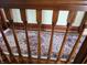 Hardwood staircase with decorative carpet runner at 23 N West St, Shelbyville, IN 46176