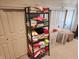 Linen closet with shelving and folding doors at 23 N West St, Shelbyville, IN 46176