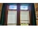 An ornate and decorative window with stained glass inserts at 23 N West St, Shelbyville, IN 46176