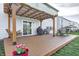 Backyard deck with pergola, swing, grill and dining area, great for outdoor entertaining at 2428 S Stonehill Way, New Palestine, IN 46163