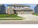 Charming two-story home with a two-car garage and well-manicured lawn at 2428 S Stonehill Way, New Palestine, IN 46163
