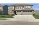Beautiful two-story home with a three-car garage, brick accents, and well-maintained landscaping at 2428 S Stonehill Way, New Palestine, IN 46163