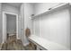 Mudroom features a built-in bench with storage, offering a convenient and organized entry space at 2428 S Stonehill Way, New Palestine, IN 46163