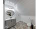 Attic bathroom featuring tile flooring, vanity with storage and a toilet with grey walls and ample lighting at 260 17Th St, Columbus, IN 47201