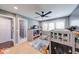 Playful bedroom with built in play structure, neutral walls and a ceiling fan at 260 17Th St, Columbus, IN 47201
