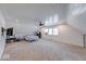Spacious bedroom features white paneled walls, carpeted floors, recessed lighting, fan and windows letting in natural light at 260 17Th St, Columbus, IN 47201