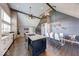 Open-concept kitchen showcasing granite counters, large island, and modern lighting fixture at 260 17Th St, Columbus, IN 47201