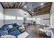 Large living room features a vaulted ceiling and wood floors at 260 17Th St, Columbus, IN 47201