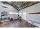 Living room with vaulted ceiling, wood floors, and plenty of natural light at 260 17Th St, Columbus, IN 47201