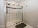 Contemporary shower with glass door and tile surround at 2803 Wild Orchid Way, Columbus, IN 47201
