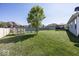 Large backyard with shed, mature trees and firepit area at 2803 Wild Orchid Way, Columbus, IN 47201