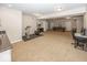 Finished basement with exercise equipment, pool table, kitchenette and office space at 2803 Wild Orchid Way, Columbus, IN 47201