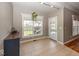 Bright bonus room featuring tile flooring, neutral tones, and a backyard view at 2803 Wild Orchid Way, Columbus, IN 47201