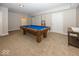 Finished basement featuring a billiard table and neutral decor at 2803 Wild Orchid Way, Columbus, IN 47201