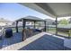 Covered back deck featuring a gazebo, outdoor seating and grill at 2803 Wild Orchid Way, Columbus, IN 47201
