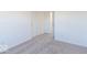 Bedroom with plush carpet and closet at 288 Commodore Dr, Pittsboro, IN 46167