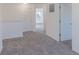 Hallway features plush carpeting and multiple entryways at 288 Commodore Dr, Pittsboro, IN 46167