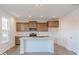 Modern kitchen featuring stainless steel appliances and a center island at 288 Commodore Dr, Pittsboro, IN 46167