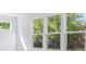 Bright room featuring large windows overlooking the home's exterior at 288 Commodore Dr, Pittsboro, IN 46167