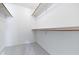 A walk in closet with shelving and gray carpet at 3114 Village Park N Dr, Carmel, IN 46033