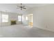 Spacious living room with fireplace and carpet, creating a welcoming atmosphere at 3114 Village Park N Dr, Carmel, IN 46033
