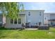 Spacious backyard with patio, outdoor seating, hot tub, grill, and privacy fence at 3286 Hemlock St, Whiteland, IN 46184