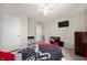 Cozy bedroom with carpet, a TV, and natural light from the window at 3286 Hemlock St, Whiteland, IN 46184