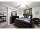 Spacious bedroom featuring comfortable furniture, soft lighting, and tasteful decor at 3286 Hemlock St, Whiteland, IN 46184