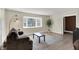 Bright living room featuring a bay window, hardwood floors, and stylish decor at 360 Hope Ct, Greenwood, IN 46142