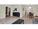 Bright living space featuring hardwood floors, dining room, and stylish furnishings at 360 Hope Ct, Greenwood, IN 46142