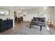 Stylish living room and dining area with modern lighting and hardwood flooring at 360 Hope Ct, Greenwood, IN 46142