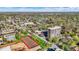 Aerial view showing a high rise condo, neighborhood, and tennis courts at 4000 N Meridian St # 9E, Indianapolis, IN 46208