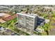Aerial view of the high-rise apartment building and surrounding neighborhood at 4000 N Meridian St # 9E, Indianapolis, IN 46208